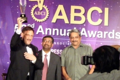 Maxim Behar (left) received the "Communicator of the Decade" Award from the President of the Association of Business Communicators of India Yogesh Joshi and the Chief Minister of Goa Manohar Parrikar. Photo by M3 Communications Group, Inc.